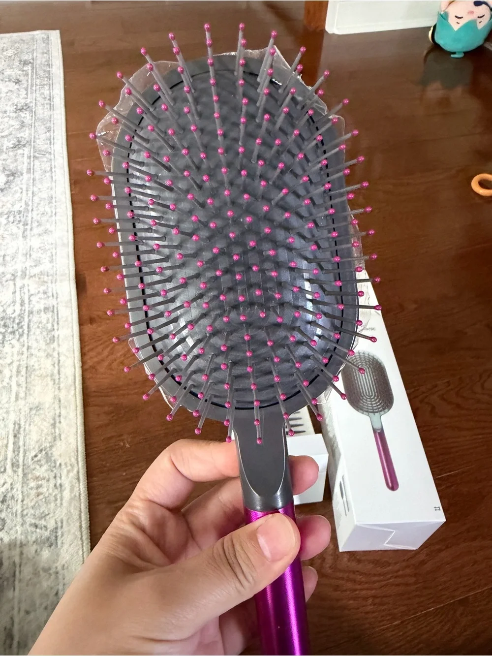 Dyson pink paddle brush with grey cushion